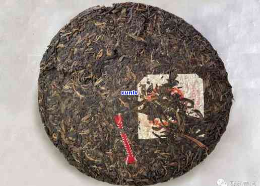 中茶青饼红丝带2003，经典传承：中茶青饼红丝带2003，品味岁月留香