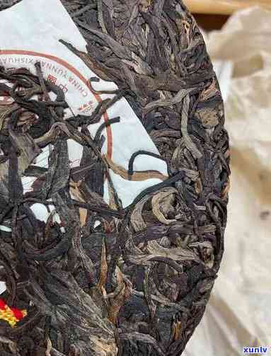 班章红丝带雀茶饼-班章红丝带雀茶饼04年