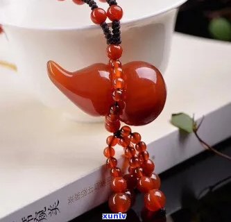 麒麟红玛瑙葫芦毛衣链，精美麒麟红玛瑙葫芦毛衣链，展现独特风格！