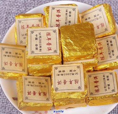 陈年普洱茶2003年小金砖一级：时光沉淀的味道，古树韵味，品鉴珍藏。